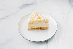 Slice cake with mango and coconut